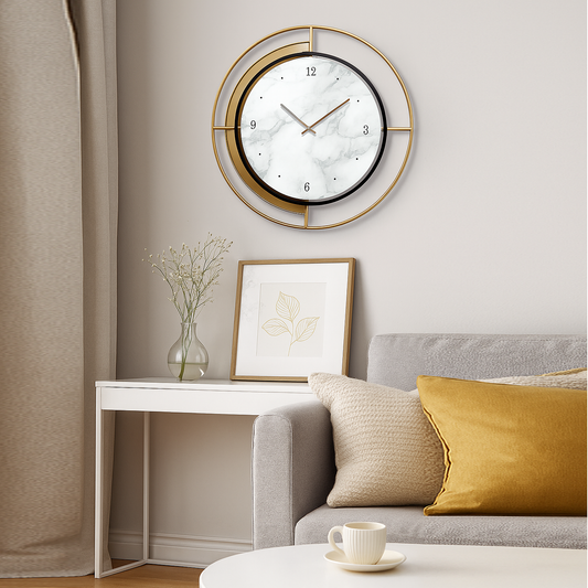 Decorative wall clock on a wall above a sofa with cushions and a small table.