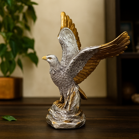 Statue of an eagle with outstretched wings in a home setting