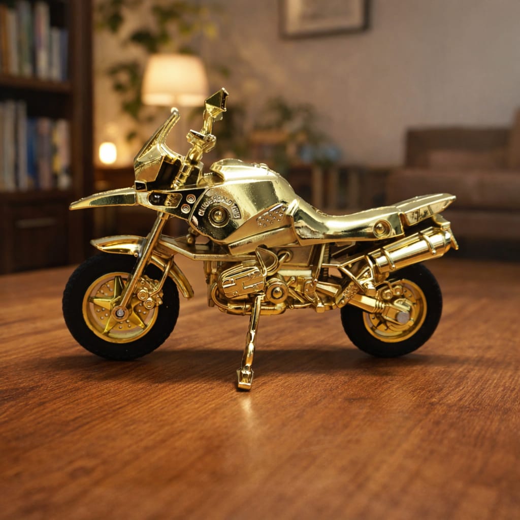 Gold motorcycle model on a wooden surface with a blurred indoor background