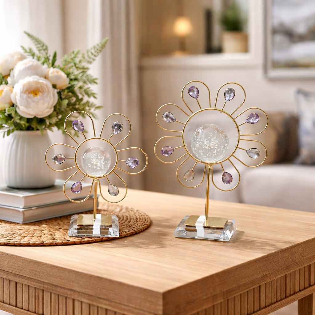 Two decorative table lamps with crystal accents on a wooden surface in a living room setting.